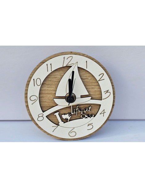 Bomboniera orologio vela, bomboniera solidale per battesimo e comunione