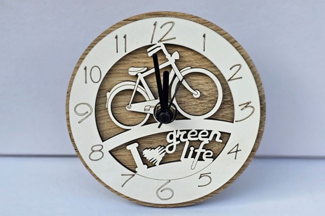 Bomboniera orologio bicicletta, bomboniera solidale per battesimo e comunione